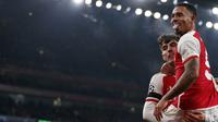 Kai Havertz (Kiri) merayakan mencetak gol pertama timnya bersama Gabriel Jesus pada pertandingan sepak bola Grup B Liga Champions UEFA antara Arsenal dan RC Lens di Stadion Arsenal di London utara pada 29 November 2023. (Ian Kington / IKIMAGES / AFP)