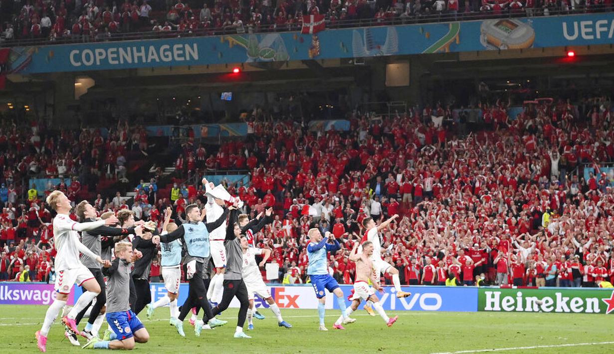 Denmark untuk pertama kalinya lolos dari babak penyisihan Euro setelah terakhir kali melakukannya pada Euro 2004. Selanjutnya mereka akan menghadapi  runner-up Grup A, Wales di babak 16 besar Euro 2020. (Stuart Franklin/Pool via AP)