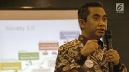 CIO Multi Inti Sarana Group dan CEO Multi Inti Digital Bisnis (MDB) Subhan Novianda memaparkan aplikasi coopRASI dan core system untuk koperasi digital di Purwokerto, Jateng, Kamis (11/7/2019). Aplikasi tersebut memberi kemudahan bagi anggota koperasi secara digital. (Liputan6.com/HO/Tino)