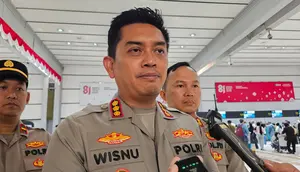 Polres Bandara Soetta Bagikan Masker dan Cek Kesehatan Calon Penumpang