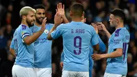 Penyerang Manchester City, Sergio Aguero  berselebrasi dnegan rekan setimnya setelah mencetak gol ke gawang Southampton pada babak ketiga  Carabao Cup 2019/2020 di Stadion Etihad, Selasa (29/10/2019). Manchester City melaju mulus ke perempat final setelah menang 3-1 atas Southampton. (AP/Rui Vieira)