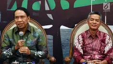 Anggota Fraksi MPR Partai Golkar yang juga Ketua Komisi II DPR RI, Zainudin Amali bersama Komisioner KPU RI, Wahyu Setiawan menjadi pembicara diskusi 4 Pillar MPR RI di Kompleks Parlemen Senayan, Jakarta, Senin (27/8).(Liputan6.com/JohanTallo)