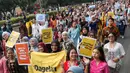 Pesan-pesan yang mereka bawa berisi tentang keberanian, mimpi, dan kemandirian. (Liputan6.com/Herman Zakharia)