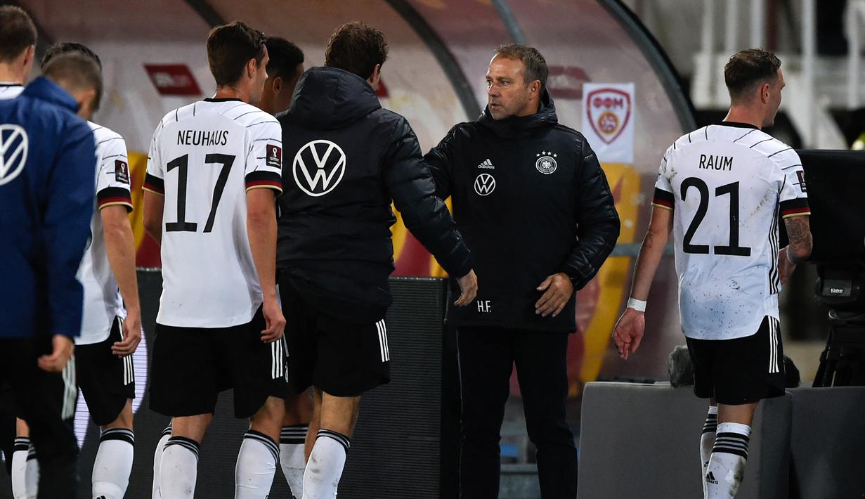 Dengan 21 poin, pasukan Hans-Dieter Fick memastikan sebagai tim pertama yang lolos ke putaran final Piala Dunia 2022 selain tuan rumah Qatar. Dengan menyisakan dua laga di Grup J, poin Jerman tidak akan terkejar oleh tim peringkat kedua, Rumania yang baru mengoleksi 13 poin. (AFP/Nikolay Doychinov)