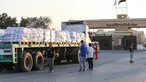 Sebuah truk bermuatan bantuan kemanusiaan menunggu izin di sisi Mesir dari penyeberangan Rafah dengan Jalur Gaza, untuk melaju menuju wilayah Palestina yang terkepung, pada tanggal 27 Juli 2025. (Foto oleh AFP)