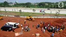 Suasana lahan baru Tempat Pemakaman Umum (TPU) khusus COVID-19, Jombang, Tangerang Selatan, Banten,Senin (26/7/2021). Pembukaan lahan baru TPU khusus COVID-19 dikarenakan tingginya angka kematian COVID-19 di wilayah tersebut. (merdeka.com/Arie Basuki)