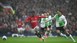 Kobbie Mainoo merupakan pemain didikan Akademi Manchester United yang dipromosikan ke tim utama pada tengah musim 2022/2023. (AFP/Paul Ellis)
