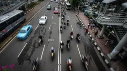Mulai Desember, Pemprov DKI  berencana akan memberlakukan pembatasan kendaraan roda dua di sepanjang Jalan Medan Merdeka Barat hingga Bundaran HI, Jakarta, Selasa (11/11/2014). (Liputan6.com/Faizal Fanani) 