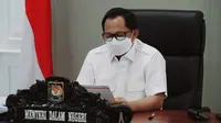 Mendagri Tito Karnavian saat Rapat Koordinasi Implementasi PPKM Darurat di Jawa Timur dan Bali, yang dipimpin oleh Menko Marves secara virtual, Rabu (7/7/2021).