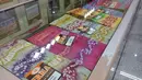 Kain Batik Sasirangan yang dijual di butik besar Kampung Sasirangan (Liputan6.com/Novi Nadya)