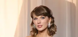 Taylor Swift tampil memukau dengan platinum set 32.40-carats berlian, cincin 18k gold set dengan berlian 5.78-carats  dan bracelet platinum set dengan 5.04 berlian carats, kesemuanya daroi the Haute Joaillerie Collection. / Foto: dok Chopard.