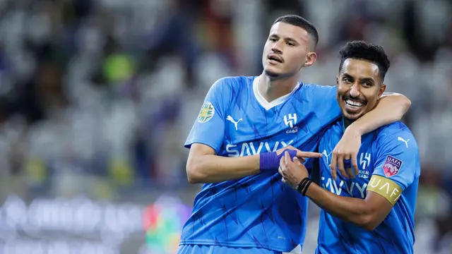 Abdullah Al-Hamdan (Kiri)