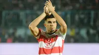 Kapten Madura United, Fabiano Beltrame berkomentar soal krisis striker yang dialami Arema. (Bola.com/Iwan Setiawan)
