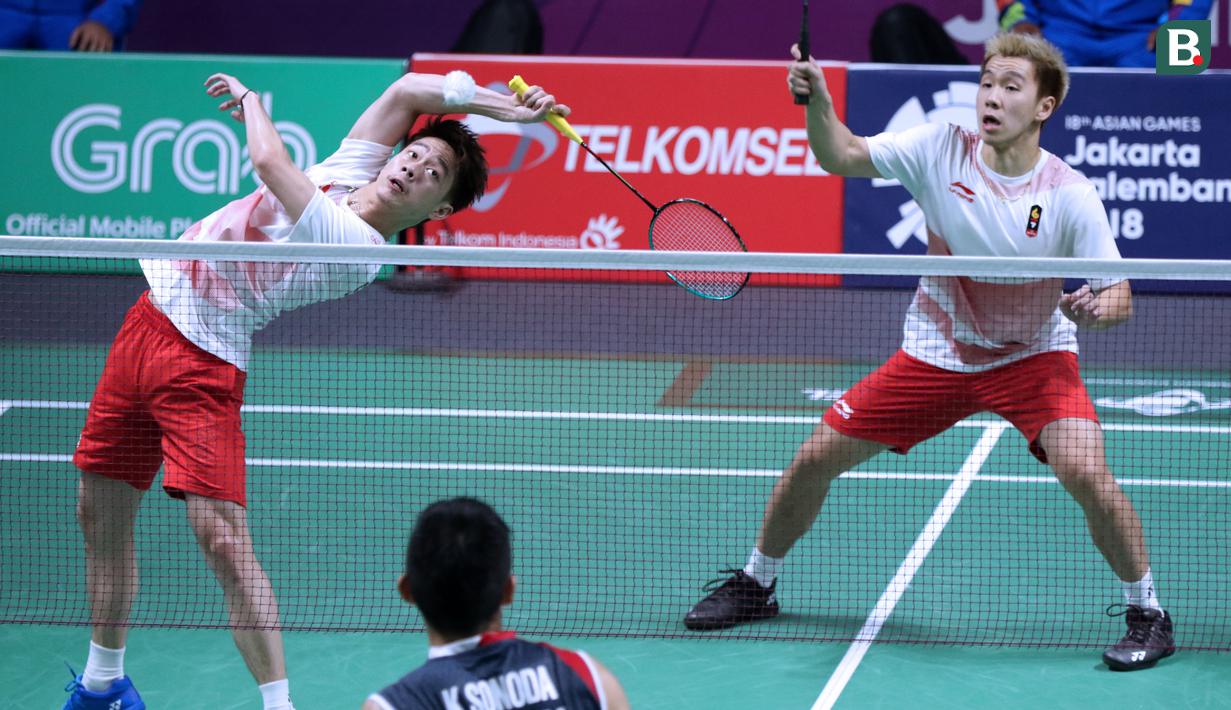 Pasangan Indonesia, Kevin Sanjaya/Marcus Gideon, saat melawan wakil Jepang, Takeshi Kamura/Kelgo Sonoda, pada laga Asian Games di Istora, Jakarta, Selasa (21/8/2018). Kevin/Marcus menang 21-18 dan 21-12. (Liputan6.com/Helmi Fithriansyah)