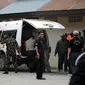 Berdasarkan pantauan di RS Bhayangkara, jenazah Wahyudi tiba dengan menggunakan satu unit ambulance milik Pemerintah Kabupaten Poso.