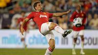 Michael Owen bergabung dengan Manchester United pada 2009-2012 dengan mencetak lima gol dari 31 penampilan. Owen pun menggantikan Cristiano Ronaldo dengan menggunakan jersey nomor tujuh. (Jim Rogash/Getty Images/AFP)