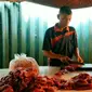 Salah satu penjual daging sapi segar di Pasar Pusat Pekanbaru. (Liputan6.com/M Syukur)