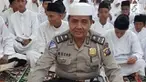 Ipda Auzar, ditabrak mobil Toyota Avanza BM 1192 RQ yang digunakan terduga teroris untuk menyerang Mapolda Riau.
