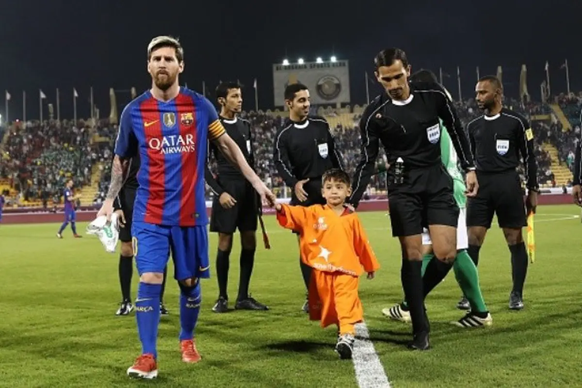Lionel Messi dan Murtaza Ahmadi