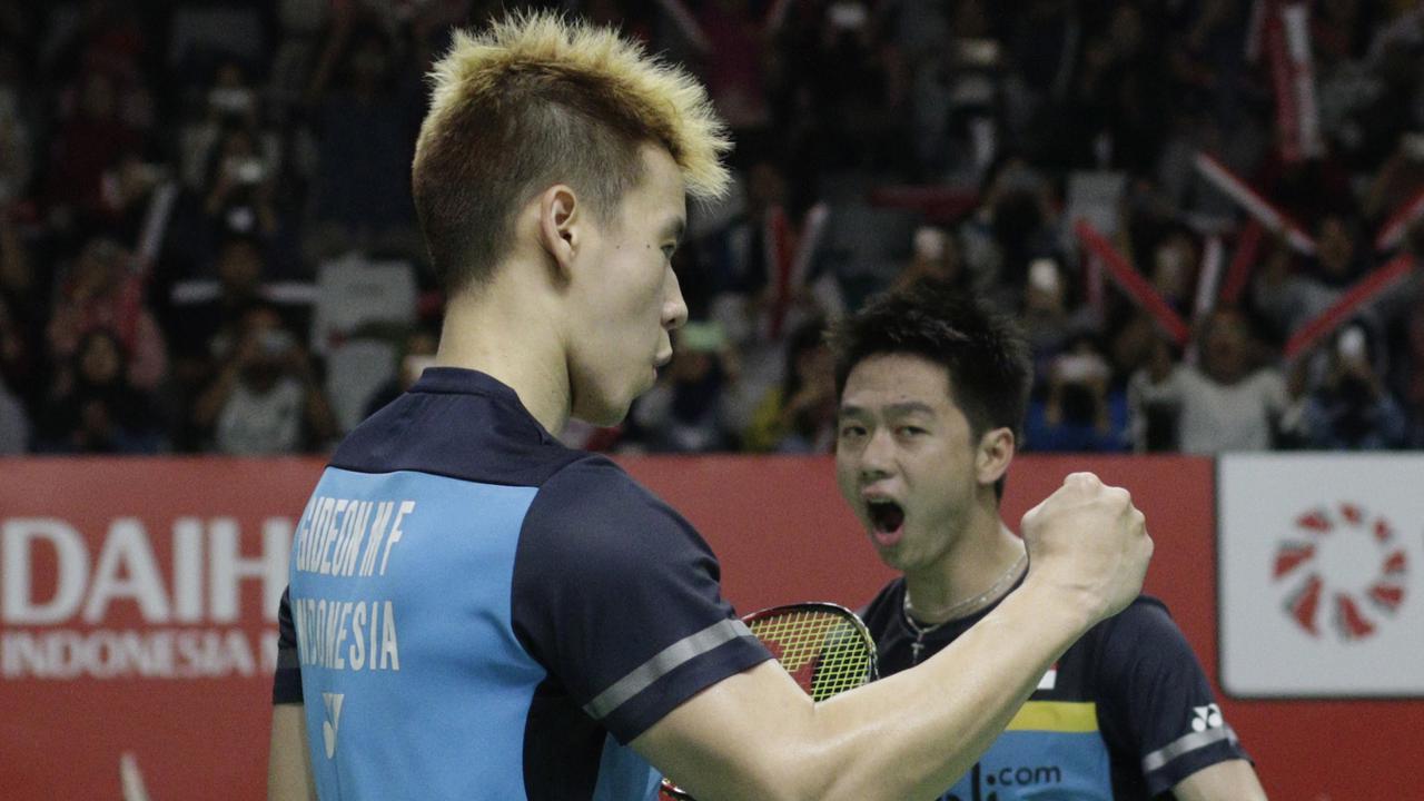Ganda putra Indonesia, Kevin Sanjaya / Marcus Gideon, merayakan kemenangan atas ganda Jerman. (Bola.com/M. Iqbal Ichsan)