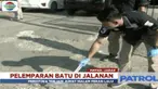 Polisi memeriksa satpam sebuah perkantoran sebagai saksi atas kasus pelemparan batu terhadap pengendara sepeda motor di Jalan Juanda, Depok.