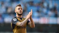 Pemain Arsenal, Jack Wilshere menempati urutan keempat pemain pilihan fans Manchester City dengan suara sebanyak 10%. (AFP/Paul Ellis)