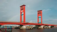 Ilustrasi objek wisata Jembatan Ampera, Palembang. (Photo by Hadi Utama on Unsplash)