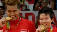 Tontowi Ahmad/Liliyana Natsir merebut emas Olimpiade Rio 2016 bulutangkis nomor ganda campuran.