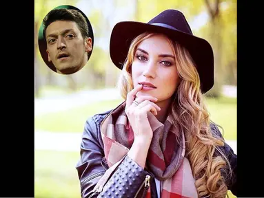 Pesepak bola Arsenal Mesut Ozil dikabarkan berselingkuh dengan Melanie Rickinger. (Istimewa)