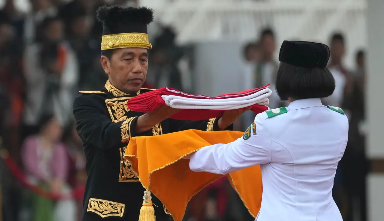 Ini menjadi kali pertama peringatan HUT RI digelar di dua tempat. (AP Photo/Achmad Ibrahim)