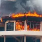 Kebakaran kantor DPRD Indragiri Hulu di Kecamatan Pematang Reba. (Liputan6.com/Istimewa)
