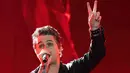 <p>Vokalis sekaligus gitaris band rock Amerika Serikat Green Day, Billie Joe Armstrong tampil pada akhir pekan Formula 1 Grand Prix Amerika Serikat 2022 atau F1 GP Amerika Serikat 2022 di Sirkuit Amerika, Austin, Texas, Amerika Serikat, 21 Oktober 2022. F1 GP Amerika Serikat 2022 diselenggarakan dari tanggal 22 sampai 24 Oktober 2022. (SUZANNE CORDEIRO/AFP)</p>