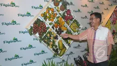 Menteri Agraria dan Tata Ruang Ferry Mursyidan Baldan meninjau pameran Agrinex Expo ke-9 di JCC, Jakarta, Sabtu (21/3/2015). (Liputan6.com/Johan Tallo)