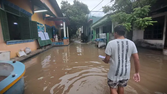 Akses jalan di wilayah kabupaten Tangerang Untuk Menuju TPS Mengalami Banjir