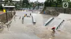 Aktivitas pengunjung di area Alun-alun Kota Depok, Jawa Barat, Senin (24/2/2020). Meskipun memasuki musim hujan, namun Alun-alun Kota Depok masih menjadi pilihan bagi sebagian warga untuk berolahraga dan berekreasi. (Liputan6.com/Immanuel Antonius)