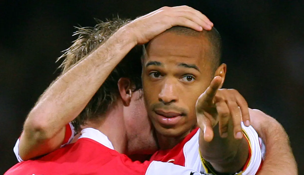 Bintang Arsenal, Thierry Henry, yang bermain di tahun 1999-2007 dan 2012 berada di peringkat 6. (AFP Photo/Odd Andersen)