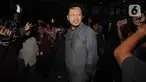 Ketua Bidang Ekonomi Pengurus Besar PBNU), Aizzudin Abdurrahman (AIZ) berjalan meninggalkan Gedung Merah Putih Komisi Pemberantasan Korupsi (KPK) usai menjalani pemeriksaan, Jakarta, Selasa (13/1/2026). Ia diperiksa terkait dugaan korupsi kuota dan penyelenggaraan haji di Kementerian Agama tahun 2023-2024. (Liputan6.com/Helmi Fithriansyah)
