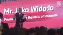 Presiden Jokowi memberi sambutan pada peresmian ekspor perdana Mitsubishi Xpander di IPC Car Terminal, Cilincing, Jakarta, Rabu (25/4). PT Mitsubishi Motors Krama Yudha Sales Indonesia mulai melakukan ekspor Mitsubishi Xpander. (Liputan6.com/Angga Yuniar)