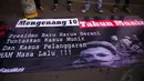 Dalam aksinya memperingati 10 tahun kematian Munir, massa menyerukan penyelesaian kasus pembunuhan aktivis HAM Munir dan kasus HAM lainnya, Jakarta, (4/9/14). (Liputan6.com/Faizal Fanani)