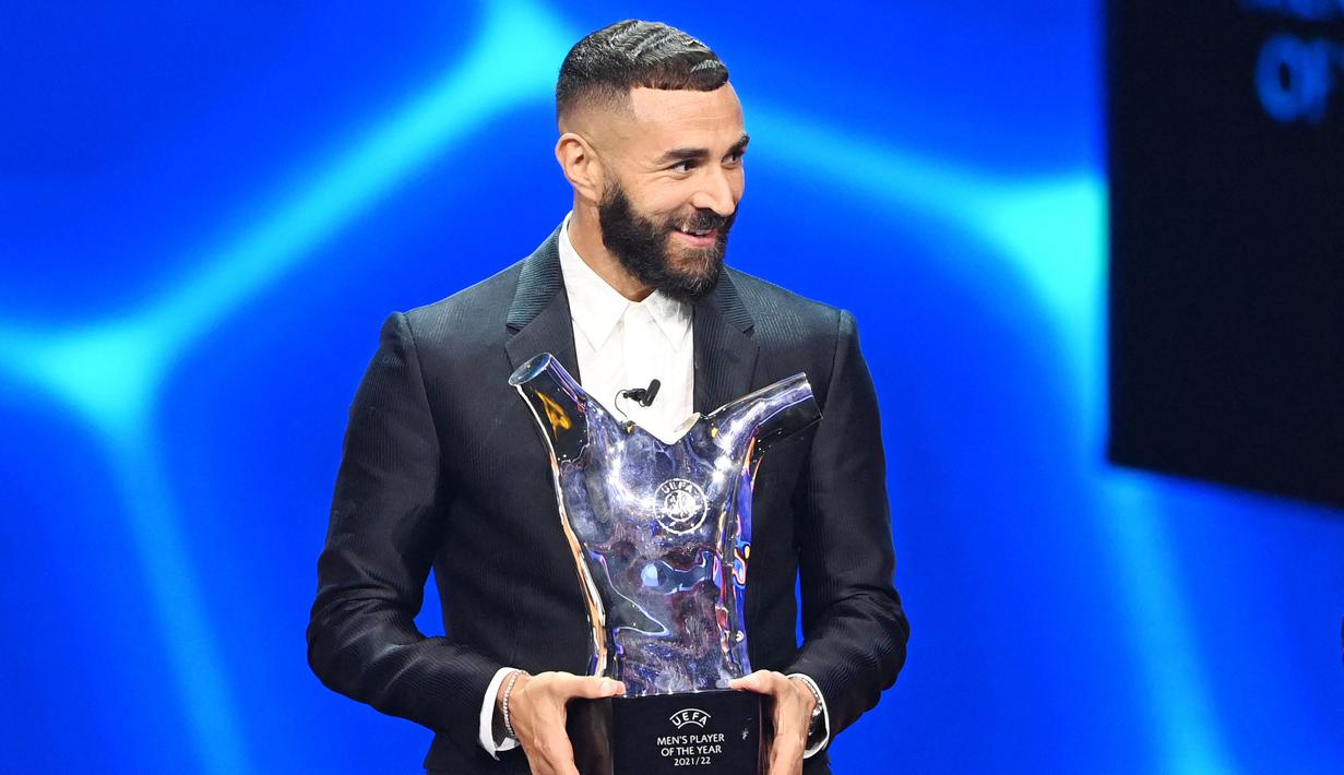 Benzema berhasil mengantar Real Madrid meraih total empat gelar. Empat gelar itu adalah Liga Spanyol, Piala Super Spanyol, Liga Champions, dan UEFA Supercup 2022. (AFP/Ozan Kose)