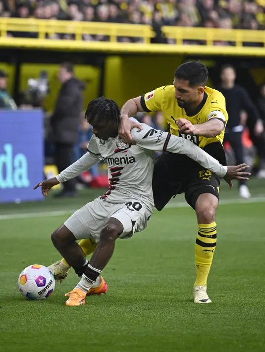 Catatan tanpa terkalahkan Die Werkself berlanjut hingga 45 laga dan kini mengantongi 80 poin di puncak Bundesliga dari 30 laga. (Sascha Schuermann / AFP)