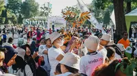 Laboratorium Lingkungan PT Citro Diagnostika Utama (CDULAB) mengadakan peringatan Hari Keanekaragaman Hayati Internasional di arena Car Free Day Simpang Lima Semarang,  Minggu (28/5/2023). (Liputan6.com/ist)