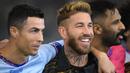 Pemain PSG, Sergio Ramos (tengah) berbincang dengan Cristiano Ronaldo setelah laga Riyadh Season Cup antara Riyadh All-Star melawan PSG yang berlangsung di King Fahd Stadium, Riyadh, Jumat (20/1/2023) dini hari WIB. Momen keakraban keduanya sangat dinantikan dikarenakan Ramos dan Ronaldo sama-sama pernah membela Real Madrid dalam waktu yang lama. (AFP/Franck Fife)
