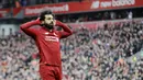 5. Mohamed Salah (Liverpool) - Pemain andalan Timnas Mesir ini berada di urutan kelima, pendapatan penyerang The Reds ini sebesar 37 juta dollar atau Rp 551 miliar. (AP/Rui Vieira)