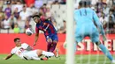 Empat gol Barcelona dikemas melalui aksi Robert Lewandowski (3’), Ferran Torres (81’), Ansu Fati (90’), dan Abde Ezzalzouli (90+3’). (Pau BARRENA/AFP)