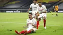 Pemain Sevilla, Lucas Ocampos, melakukan selebrasi usai mencetak gol ke gawang Wolverhampton Wanderers pada perempat final Liga Europa, Selasa (11/8/2020). Sevilla menang dengan skor 1-0. (Friedemann Vogel, Pool Photo via AP)