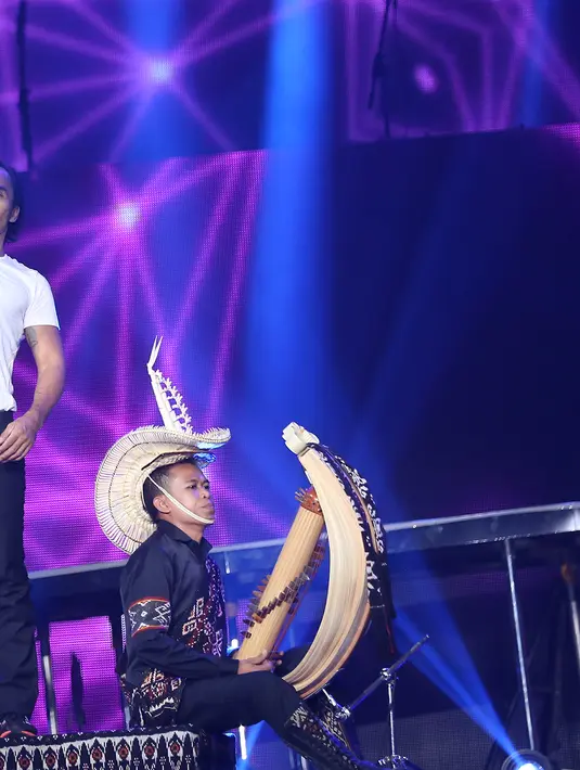 Penampilan Slank di Konser Raya 21 Tahun Indosiar Istora Senayan, Jakarta, Senin malam (11/1/2016). (Andy Masela/Bintang.com)