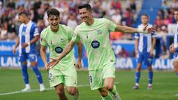 Robert Lewandowski menjadi bintang utama dengan mencetak hat-trick di babak pertama saat Barcelona membungkam Deportivo Alaves 3-0, Minggu (6/10/2024). (Cesar Manso/AFP)