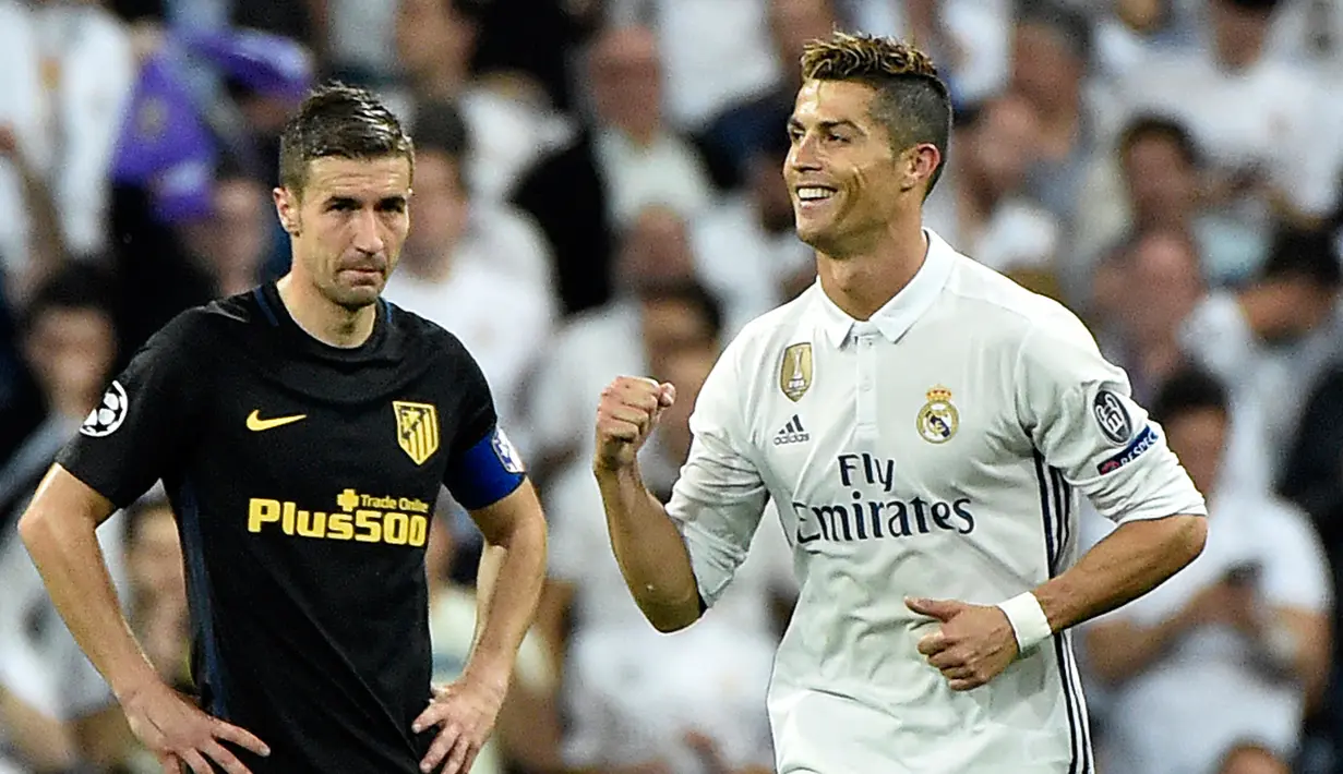 Tiga gol yang digelontorkan Cristiano Ronaldo (CR7) ke gawang Atletico Madrid  saat pada leg pertama semifinal Liga Champions menjadikannya sebagai pemain pertama yang mengemas 50 gol di fase gugur Liga Champions, Spanyol, Selasa (2/5). (AFP Photo)