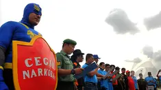 Badan Narkotika Nasional (BNN) Provinsi DKI Jakarta menggelar acara Gerakan Wajib Lapor Bagi 100.000  masyarakat Jakarta yang menggunakan Narkoba agar dapat menjalani proses kesembuhan. di Monas, Jakarta, Sabtu,(28/2/2015). (Liputan6.com/Faisal R Syam)